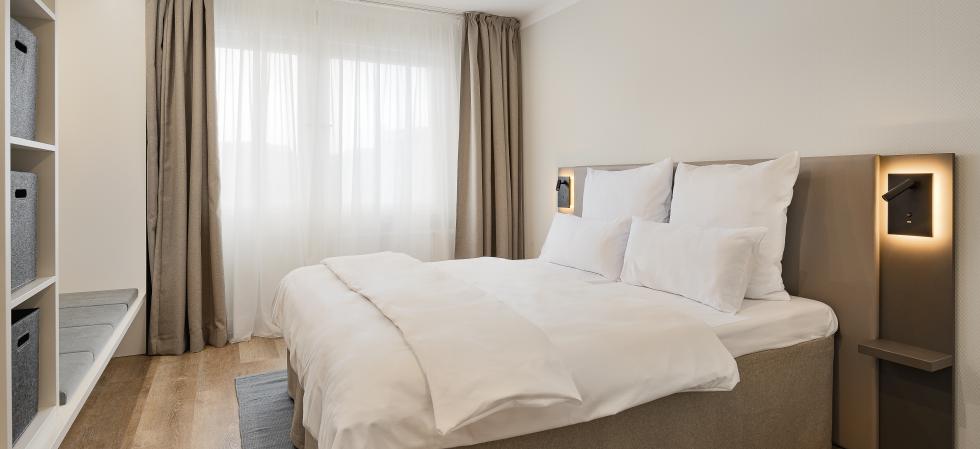 Bed room in the Apartments am Brandenburger Tor in Berlin